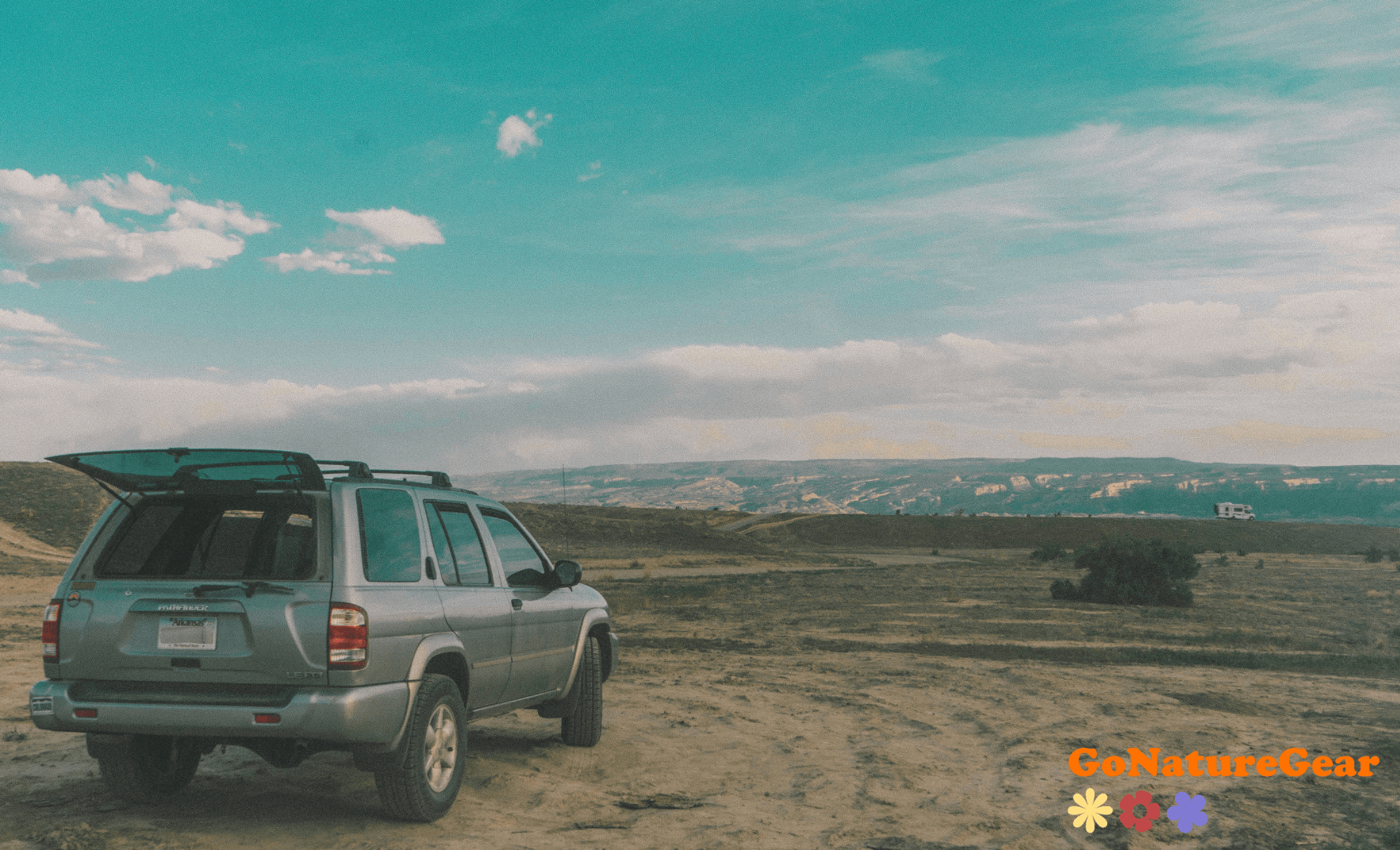 Car camper on a small road with some great views