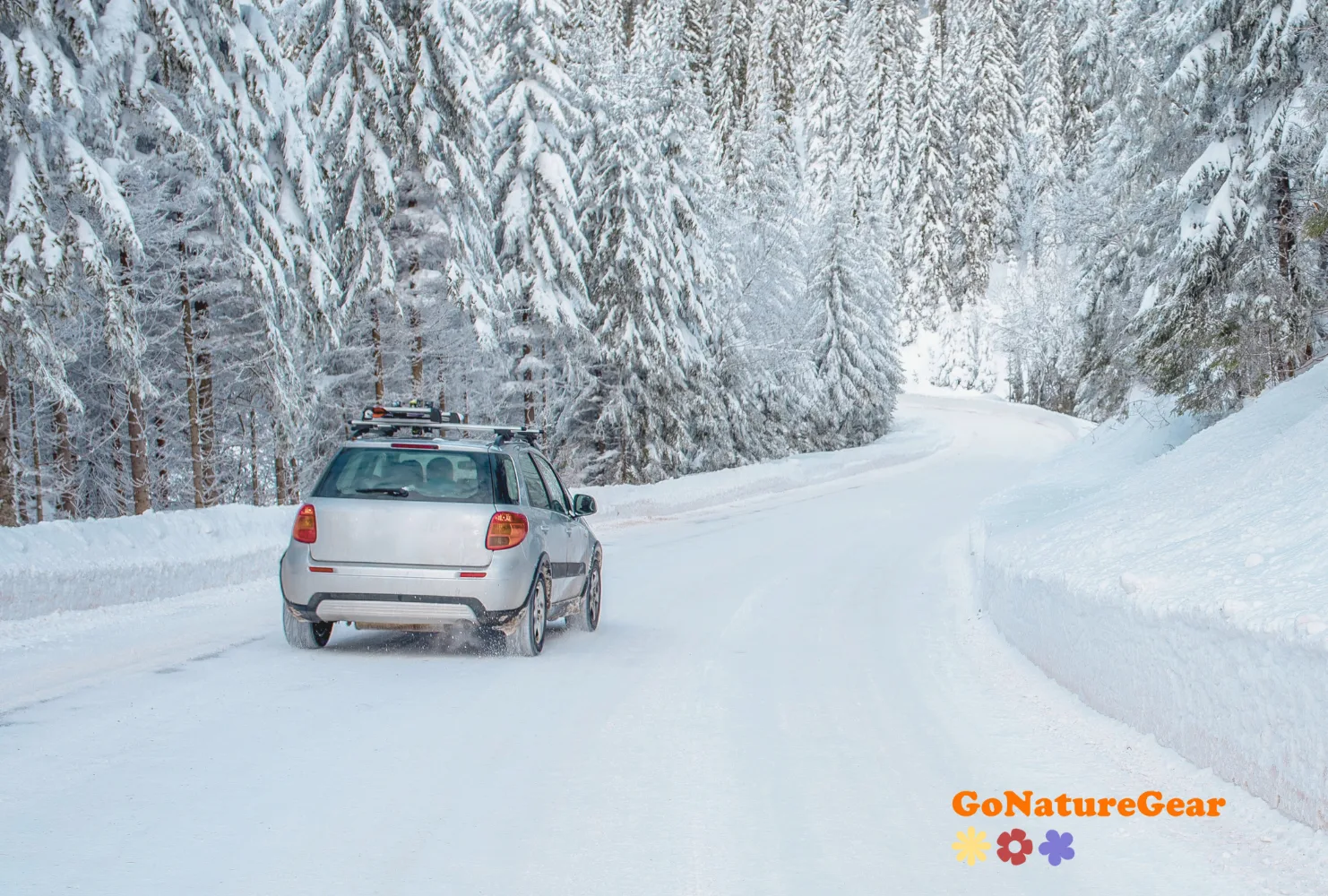 A car on its way into the winter landscape to car camp.